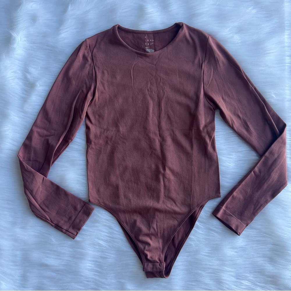 ❌SOLD❌A New Day long sleeve bodysuit